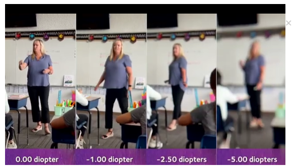 Child with glasses reading a book